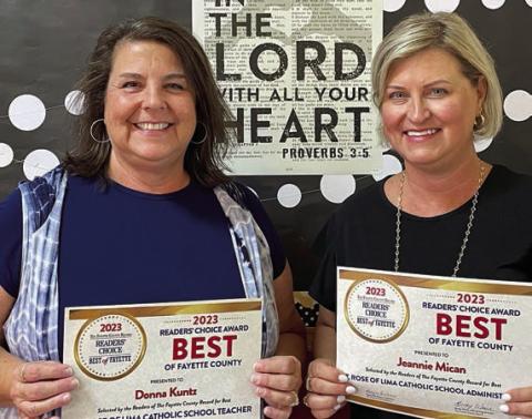 St. Rose of Lima Catholic School staff members Donna Kunz (left), teacher, and Jeannie Mican, (right), administrative assistant, were selected for this year’s Fayette County Record Readers’ Choice Award as winners from the school.