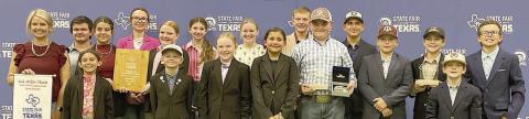 Fayette County 4-H’ers participating in the State Fair of Texas Livestock Judging Contest were (front row, from left) coach Kaci Carrales, Emma Zweschper, Joe Carrales, Abigale McBride, Chandler Brooks, Abraham McBride, Hudson Holub, Rowdy Guenther, (back row) Logan Poncik, Adalyn Carrales, Tatum Fritsch, Kaisley Janecka, Laramie Laake, Julia Melton, Holden Holub, Dylan Zwescpher, Crockett Guenther and Tate Fritsch.
