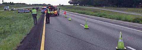 DPS, Fayette County EMS, and Schulenburg SVFD personnel attend to the accident in the median of I-10 last Wednesday which caused the outside westbound lane to be closed for about an hour and a half.