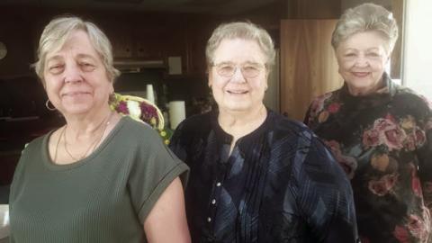 Hostess es were (from left) Debbie Behlen, Janet Kobza and Patricia Greeson.