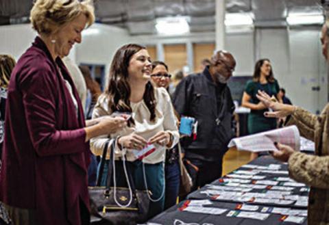 Guests check in to South Central Texas Rural Philanthropy Day, held on Friday, Nov. 3 at the Randolph Recreation Center in La Grange.