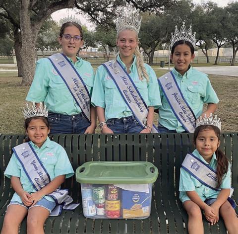 Miss Schulenburg & her court assembled a Thanksgiving basket for the Family Crisis Center. Shown are (front row, from left) Young Miss Saphrin Manzano, Little Miss Rylah Manzano, (back row) Miss Schulenburg first runner-up Agnes Tofel, Miss Schulenburg Heaven Hrachovy and Junior Miss Jazmyn Moreno.