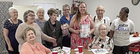 Ten poun ds of groun d beef were donated to Senior Connections by Navidad Valley CattleWomen. Shown are (seated, from left) Judy Klesel, Aileen Kasper, (standing) Margaret Campbell, Carolyn Moore, Betty Mulholland, Dineen Thayer, Tanya Schindler-NVCW, Susie Shank-NVCW, Elroy Dieringer and Darleen Williams.
