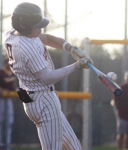 Jayse Janda connects for the first of his seven hits in the series. Sticker Photo By Darrell Vyvjala