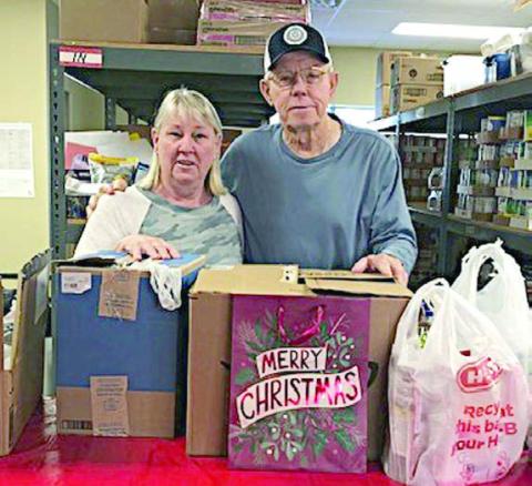 Holman KJZT donates to Food Pantry
