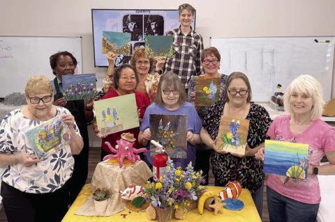 In Jaime Janda’s Artful Friday class, students were tasked to paint a still life. Whether they chose to focus on one small section or a large portion of the display, each created something very individual and unique. Shown are (from left) Maxine Farley, Deborah Jones, Amparo Salinas, Nancy Hillary, Verna Lenth-front, Jaime Janda, Berni Gillings, Sharon Friedrich and Kim Penland.