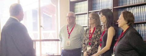 SHOWN At the swearing-in on July 29 for new CASA volunteers are (from left) Benton Eskew, court at law judge, who swore in Scott Davis of La Grange, Becky Herrin of Bastrop, Mary Jo Kilpatrick of Cedar Creek and Pamela Quarles of Elgin.