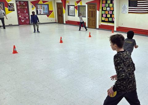 Members of the Schulenburg Unit of the Boys & Girls Club love a good game of dodgeball! Members are encouraged to get active and dodgeball does just the trick. Shown are (front, from left to right) Club members Michael Muras and Angel Reyes, (back, from left to right) staff member Megan Pledger and Club members Dredyn Wright and Adonis Thomas.