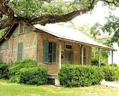 Frederick William Grasmeyer, who died in 1887, left a sizeable donation and his extensive personal library to start a library association in La Grange. Pictured is the original La Grange Library. Photo Courtesy of Fayette Museum &amp; Archives