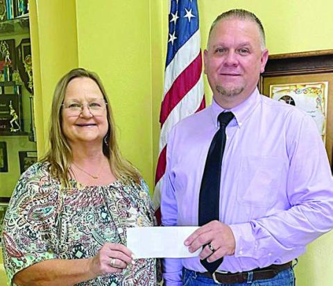 KCs donate $5,000 to St. Rose School