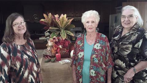 Hostesses were (from left) Shirley Winkelman, Mary Demel and Jan Ripper.
