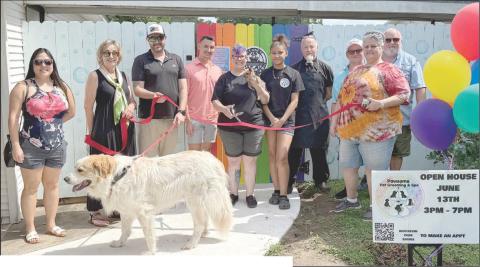 ON HAND AS THE RIBBON WAS CUT at Pawsome Pet Grooming and Spa were: (from left) Ellie Shin, Diana Mikesky-Schulenburg Chamber of Commerce president, Chris Veit, Josh Lichnovsky, Andi Lee-owner, Brie Pugh, Garrett Pettit, Will Kuhn, Diana Bagley, and Michael Kuhn-Schulenburg Chamber of Commerce director.