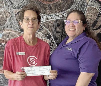 New registration fees for April were donated by Anytime Fitness.Program director Stephanie Shroyer (left) received the donation from Amanda Brown (right). Senior Connections is so grateful to Anytime Fitness for this kind gesture.