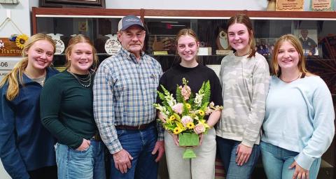 Floral design and shop show results was part of the program given by Schulenburg FFA officers at the Young Farmers meeting. Shown are (from left) Keeley Warnken and Haley Schramek, FFA’ers; Mark Vecera, Young Farmers president; and Kaylee Beyer, Madyson Holub and Kyrroll Prihoda, FFA’ers.
