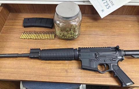 After a vehicle pursuit by law enforcement from Engle to east of Weimar, items confiscated from the vehicle included a stolen rifle and marijuana.