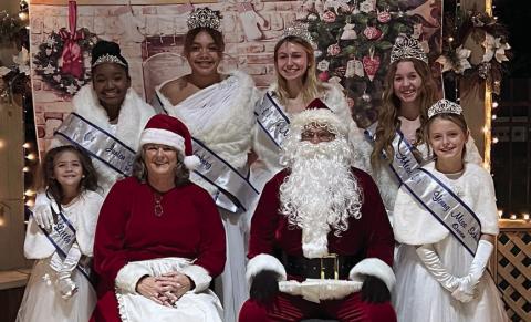 Miss Schulenburg and her court were on hand for the lighted Christmas parade and the visit by Santa and Mrs. Claus on Sunday, Dec. 4. Shown are (front row, from left) Layla Perales, Little Miss first runner-up; Mrs. Claus and Santa Claus; Kynslee Zapalac, Young Miss; (back row) A’Niyah Utley, Junior Miss first runner-up; Arianna Goff, Junior Miss; Scarlett Wagner; Miss Schulenburg; and Harly Zapalac, Miss Schulenburg, first runner-up.