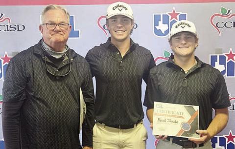 Shown after the Region IV-2A golf tournament are: (from left) coach Richard Hoogendoorn, Jayse Janda, and Reid Janda.