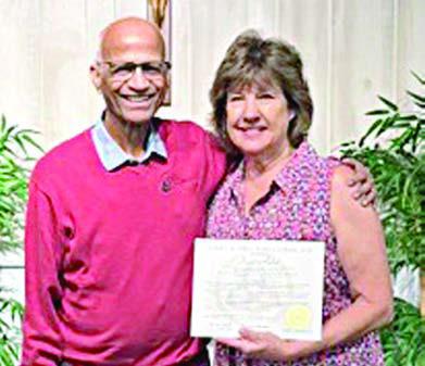 Accelerated track certificate recipient was Diane Holub (right), with the presentation made by Dr. Michael Fonseca (left), God’s Embrace Ministries founder.