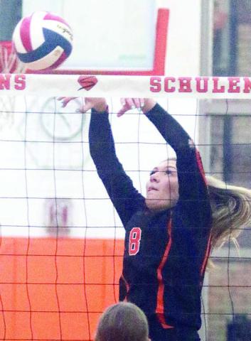 Greenli VanZandt taps down a Stockdale over-pass in the second set. Sticker Photo By Darrell Vyvjala