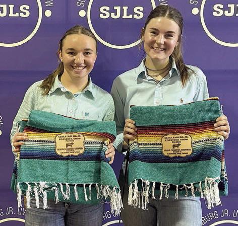 Swine – grand champion Madyson Holub (right) and reserve champion Mikayla Otto (left).