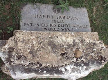 Handy Holman Jr. Headstone, overturned but still visible in the Holman Cemetery. The inscription reads “Handy Holman, Texas, Pvt., 15 Co. 165 Depot Brigade, World War I.” Photo Courtesy of Dr. Michelle and Anthony Hill