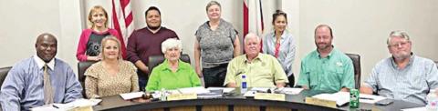 CITY OF SCHULENBURG OFFICIALS and PAT personnel on hand for the signing of a proclamation honoring Parents As Teachers were (front row, from left) Greg Thomas, Place 1 Alderman; Wendy Fietsam, Place 2 Alderman; Mayor Elaine Kocian; Larry Veselka, Place 5 Alderman; Ben Herzik, Place 3 Alderman; Clarence Ahlschlager, Place 4 Alderman; (back row, from left) Phyllis Venghaus, Josue Rivas, Windi Raphael and Zulma Hay, representing Parents As Teachers.