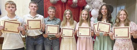 Top Eighth Grade Students – (from left) Weston Hollas, Algebra I (tie), science, English and social studies; Bo Brossmann, Algebra I (tie); Holden Holub, band (tie); Mallory Bonner, reading; Tenley Zbranek, yearbook and band most improved; Courtney Magliolo, religion and band (tie); and Reese Dusek, math.