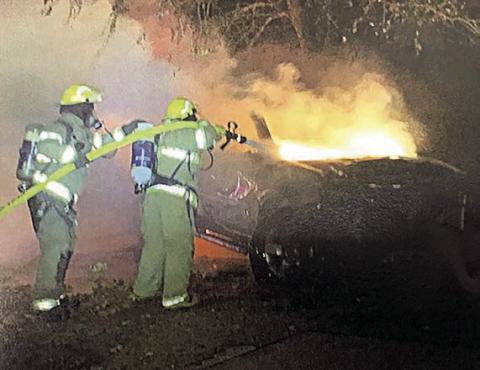 A 2011 GMC Acad ia caught fire at a residence, with firefighters from the Ledbetter Volunteer Fire Department responding to the scene and extinguishing the fire. Photo Courtesy of Fayette County Sheriff's Office