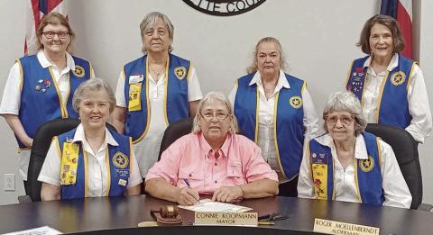 A proclamation designating May 23 as “Poppy Day” in Schulenburg was signed by Mayor Connie Koopmann in the presence of American Legion Auxiliary Unit 143 representatives. Shown are (front row, from left) Patricia Hranicky, Auxiliary vice president; Mayor Connie Koopmann; Peggy Fish, Auxiliary president; (back row) Dana Bartosh, Auxiliary member; Debora Behlen, treasurer; Sandi Guthrie, sergeant-at-arms; and Patricia Marty, historian.
