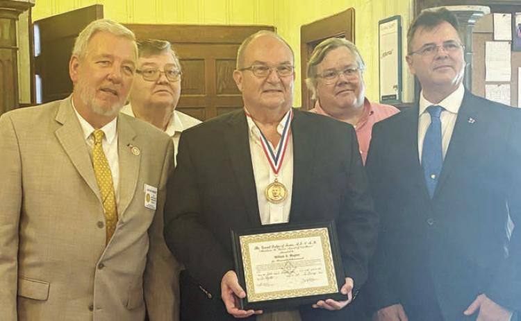 William “Bill” Wagner received Mirabeau B. Lamar Medal from the La Fayette Masonic Lodge, with the following on hand for the presentation: (from left) R.W. Lonie S. Mercer, District Deputy Grand Master; Brother Jackie Skelton, retired La Grange Chief of Police; Wagner with his medal and certificate; Brother Jeff L. Messer, lodge officer; and Brother Scott Noles, Master of the Lodge.