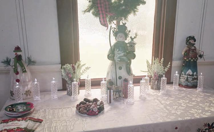 The Dessert Table, awaiting goodies from the hostesses, also had festive decorations.