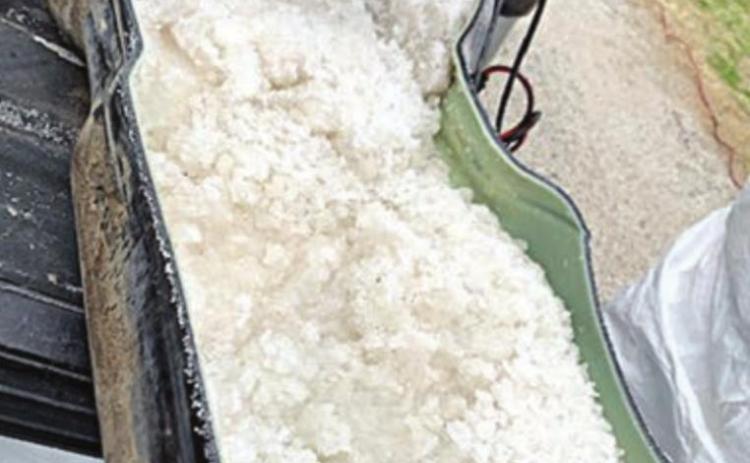 Sgt. Randy Thumann and K-9 partner Kolt, pictured at right, located methamphetamine valued at $3,830,130 in an altered gas tank during a traffic stop on Interstate 10 near Engle. The gas tank with the meth exposed is pictured above.