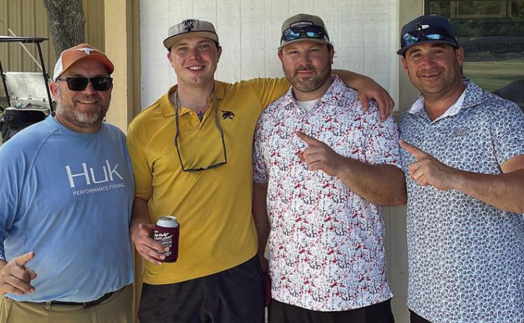 First Flight, First Place (14 under par / 58) – (from left) Darrell Vyvjala, Kade Vyvjala, Clayton Besetzny, and Tommy Brown.