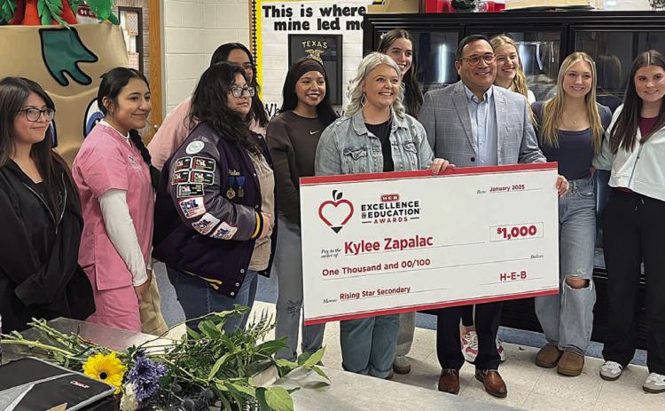 SHS grad garners teaching award from HEB