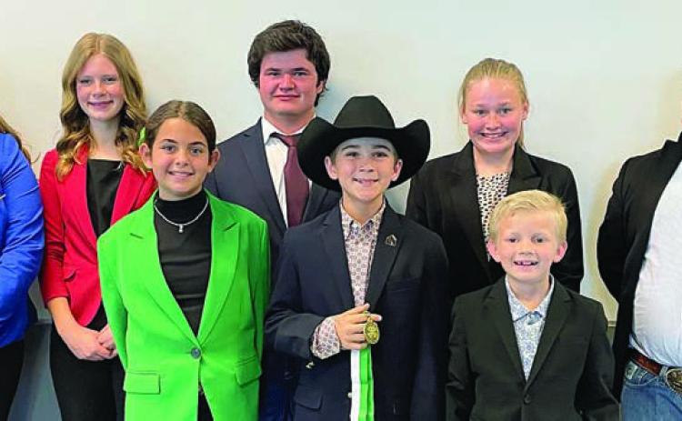 Public Speaking Contestants – (from left) Rheagan Karisch, Sawyer Mau, Adalyn Carrales, Logan Poncik, Crockett Guenther, Julia Melton, Joseph Carrales and Rilan Karisch. Guenther is a member of the Schulenburg 4-H.