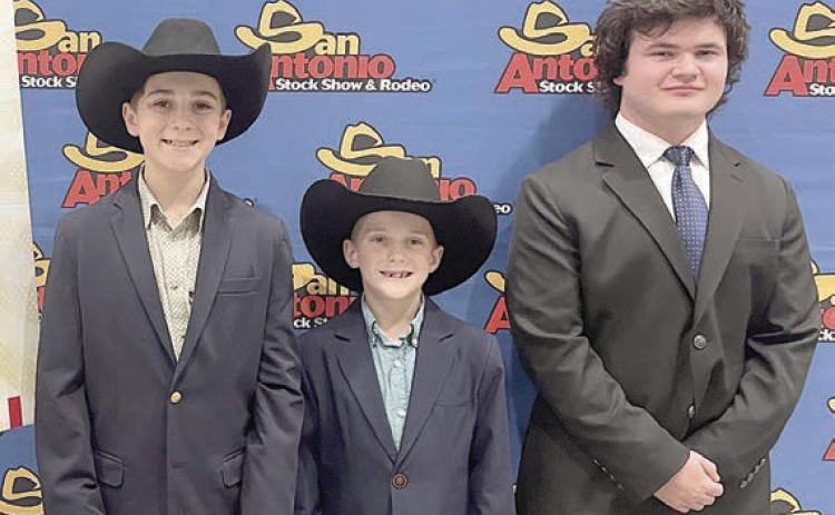 Competing in the San Antonio Livestock Show Agricultural Public Speaking Contest were Ifrom left) Crockett Guenther, Rowdy Guenther and Logan Poncik.