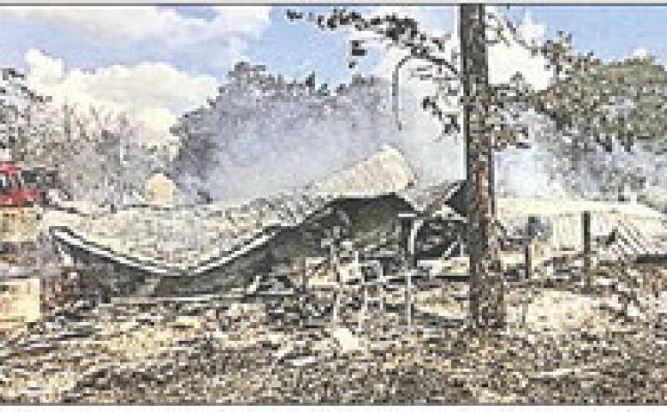 Structure burns north of La Grange