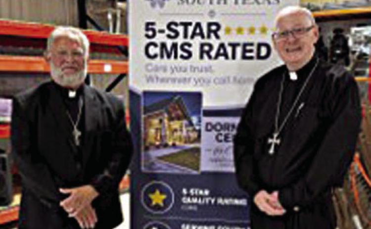 A new support services building in Victoria for Hospice of South Texas was dedicated by Pastor Herb Beyer (left), who serves area Lutheran churches, and Bishop Brendan Cahill (right) of the Catholic Diocese of Victoria.