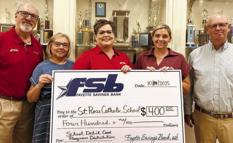 On ha nd as Fayett e Savings Bank presented a check to St. Rose of Lima Catholic School through its School Spirit Debit Card Program were (from left) Mike Olle, FSB; Michele Kubos, St. Rose School bookkeeper; Cheryl Brossmann, FSB; Taylor Jensen, St. Rose School principal; and Gary Zweschper, St. Rose School Advisory Council president.