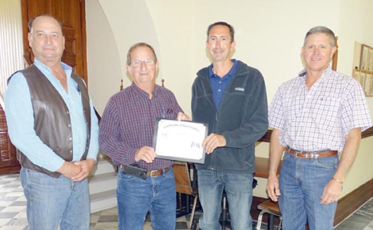 Certificate of appreciation presented to Muras