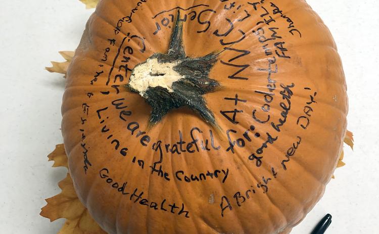 “Gratitude Pumpkin” at  NVCC contains messages of gratitude written by members. The inscriptions will continue through Nov. 20.