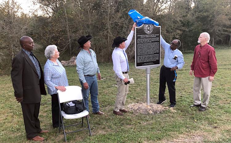 Connersville Primitive Baptist Church African American Cemetery had a Historical Marker dedicated on Monday, Nov. 15. Shown are (from left) Raymond Bryant, presiding elder of the Tenth Episcopal District Southwest Conference; Bobbie Nash, Fayette County Historical Commission chair; Luke Sternadel, Fayette County commissioner; Fayette County  Judge Joe Weber; and David Collins and Neale Rabensburg, historians and members of the Fayette County Historical Commission and the Round Top Area Historical Society.