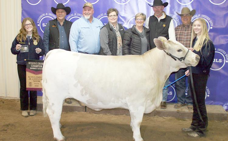 RESERVE CHAMPION MARKET STEER –  Exhibitor: Olivia Mathis (right).