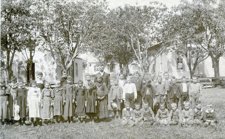 The Willow Springs school building on the left was one of those early rural schools that had been built by November 1875. The 1870s teacherage, which still stands as a private residence, is in the background of this mid 1890s photo. The “new” school building is on the right. Photo Courtesy of Fayette Heritage Museum & Archives
