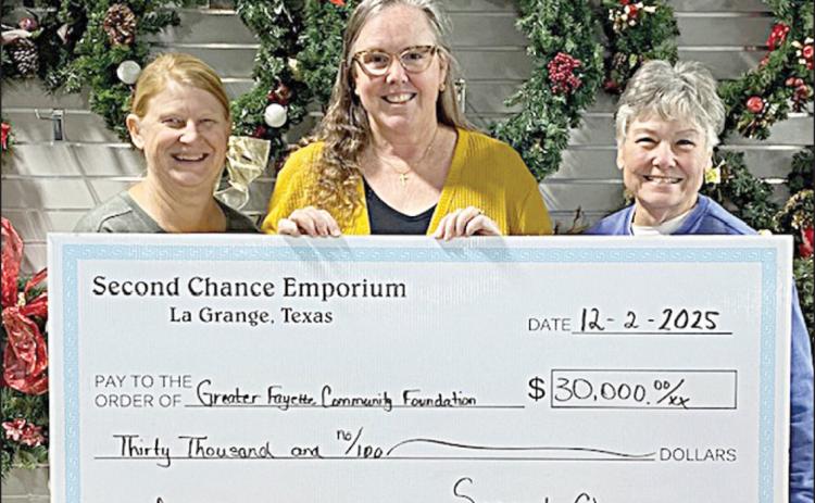 On Hand aS a $30,000 dOnaTiOn was presented to the Greater Com munity Foundation to be used by the ACCSS program were (from left) Marlene  Schnell, SCE assistant store director;  Susie Shank, ACCSS director; and Darlene Strahan, SCE assistant store director.
