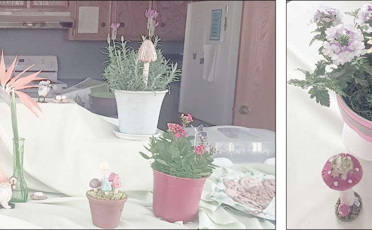 A spring theme was carried out in the decorations, including the main centerpiece (left photo) and table centerpieces (center photo). Among the decorative items were cute bird and eggs figurines (right photo).