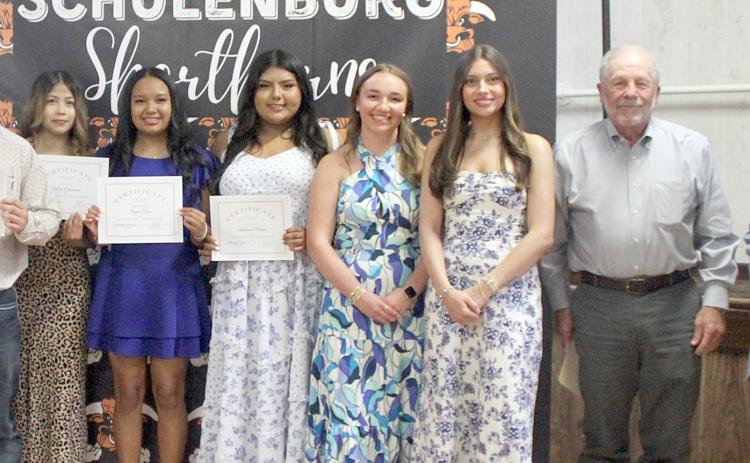 For the Wanda Johnson Beaudry Stanzel Memorial Scholarship presentation, on hand were (from left) Ruby Rodriguez, 2025 WJBS Scholar; Aidan Mendez, Jailyn Guerrero, Daysi Rico and Shalanie Olvera, 2026 recipients; Mikayla Otto, 2025 WJBS Scholar; Fay Kutac, 2025 WJBS Scholar; Bob Srubar, WJBS scholarship committee member; and Theodore Stanzel, who established the scholarship in partnership with the Stanzel Family Foundation.