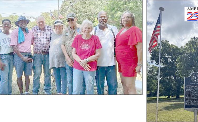 amonG THoSe PReSenT for the flag dedication at the Alleyton Cemetery were (photo above, from left)  Donald Peitert, Theresa Williams, Gina Carter, Tandy Carter, Roger Wade, Marilyn Wade, David Zachmeyer,  Judy Zachmeyer, Deacon Michael Fitzgerald and Monrovia Fitzgerald. The photo at right shows the flags on either side of the Alleyton Cemetery Texas Historical Marker.