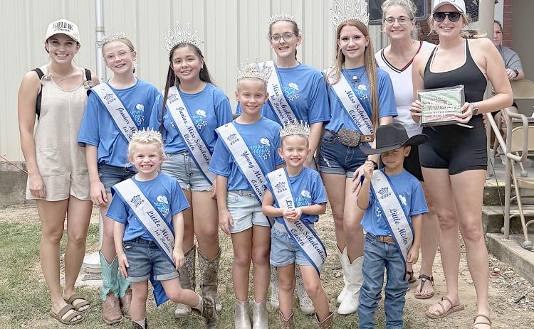 Local Chili 1st Place – “Barefoot Cookers,” represented by Krystana Stavinoha Henson (left), Charlet Sedlar  (back, second from left), and Kaylyne Harp (right). Also shown is Miss Schulenburg and her court. 2nd Place – “Mars BBQ” – Eddie Faith. 3rd Place – “Velvet Bordello” – Chancy Horn. Sticker Photo By Layne Vyvjala