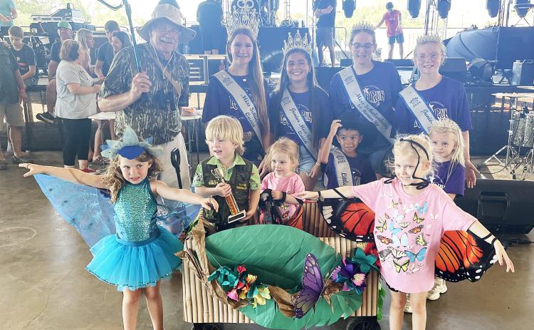 First Place – “Jungle Boogie” - Stella & Izzy Shields and William & Vivian Dennis along with Tom Brents. Also  shown is Miss Schulenburg and her court. Sticker Photo By Darrell Vyvjala